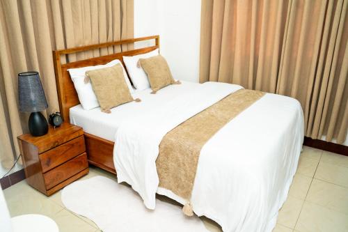 Rooms of The Modern Nest Stylish 1BR MbeziBeach with Fast WiFi, Work Desk & Smart Home