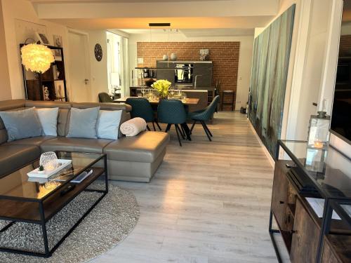Prora - Wohnung mit Balkon und Infrarotsauna - Strandloft – khách sạn tại Prora