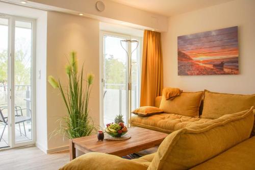 Prora - Apartment mit Strandkorb am Strand - MeerSonneWind – khách sạn tại Prora