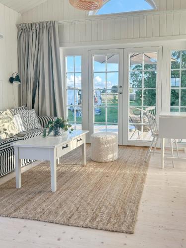 Minihus i lantlig miljö nära havet (Minihus i lantlig miljo nara havet) in Smygehamn