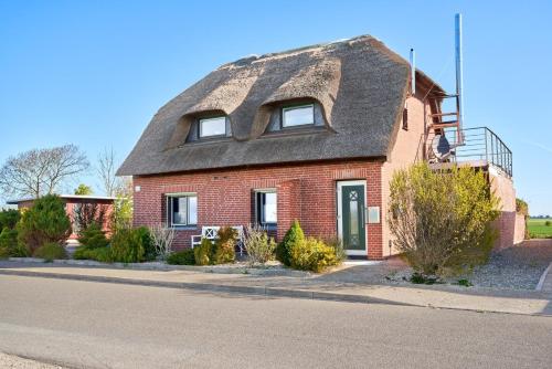 Reetdachhaus Südwind in Nordstrand, Deutschland