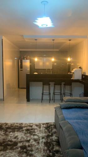 Casa aconchegante com piscina e garagem dupla – khách sạn tại Rasa