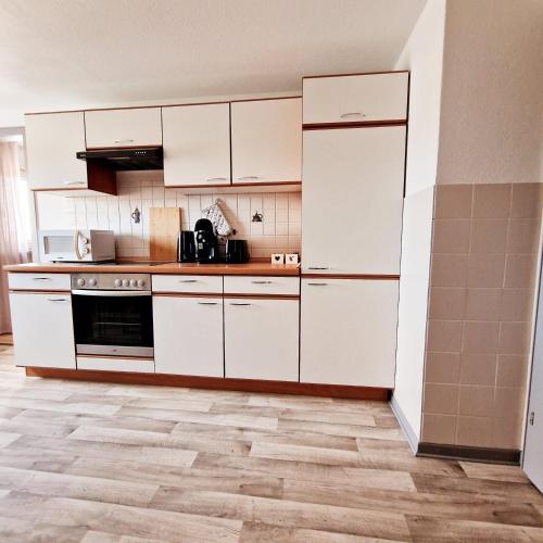 Konyha, Holle - Land Holidays, Ferienwohnung mit schöner Aussicht (Holle - Land Holidays, Ferienwohnung mit schoner Aussicht) in Hessisch Lichtenau