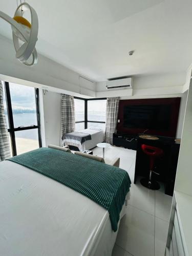 Tropical Executive Flat Vista Incrível para a Orla (Tropical Executive Flat Vista Incrivel para a Orla) in Beira de Rio
