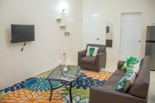 Paradis Des Palmiers 4 Gorgeous 2-bedroom flat – khách sạn tại Làng Potters