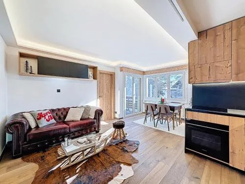 From green to slopes - Alpine ski and golf condo in Crans-Montana, Schweiz