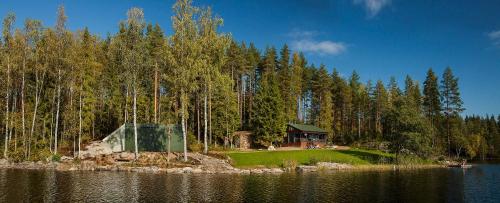 Exterior view, Fairy tales on the forest lake in Vavesaari