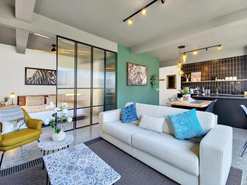 City Oasis Apartment with Rooftop Pool - Tap to explore photos