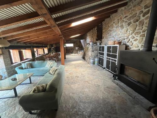 Shared lounge/TV area, Antiguo Molino con piscina y chimenea en el valle del Tietar in Casavieja