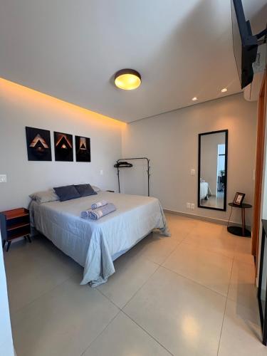 Loft moderno no Santa Efigênia, ar condicionado e garagem – khách sạn tại Leste