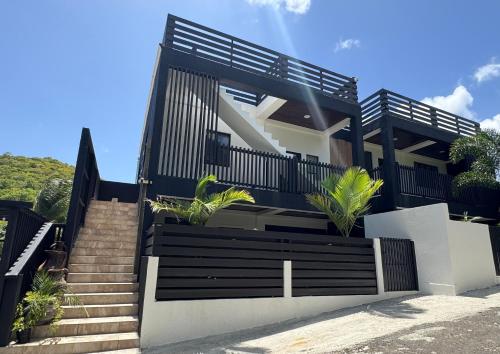 Sea View Condo, 5 Mins from UVF Intl Airport – khách sạn tại Mamiku