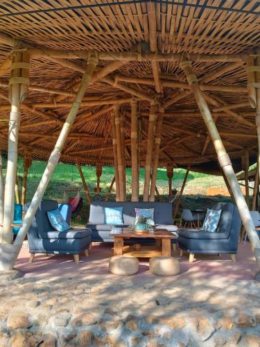 Cabanas ecologicas con vista espectacular y cascada privada - Finca Qawana Ecolodge en San Carlos in San Carlos