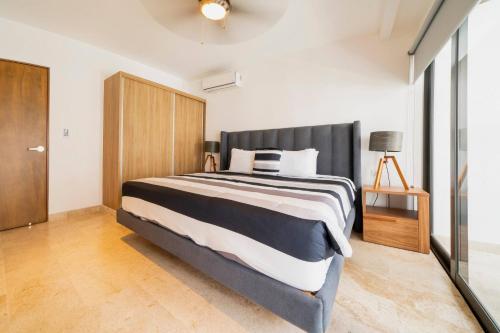 Ipana 212 - 2BR in Heart of PDC with Pools & Gym