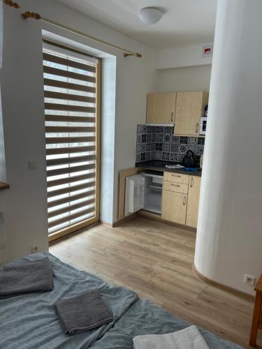 Útulný apartmán s terasou na Šumavě v malebné vesničce Prášily (Utulny apartman s terasou na Sumave v malebne vesnicce Prasily) in ปาเซกา