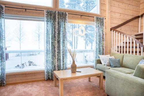 Aufenthaltsraum/TV-Zimmer, Villa Siltasaari in Sotkamo
