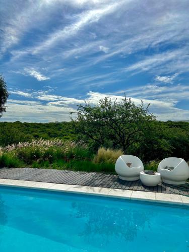 Peldbaseins, Villa Santa Teresita in La Granja