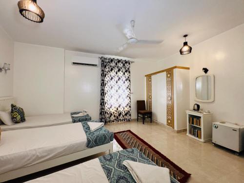 Amon Hotel Room Type - Deluxe Triple Room
