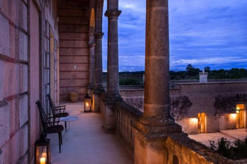 Suite con balcón y vistas al jardín