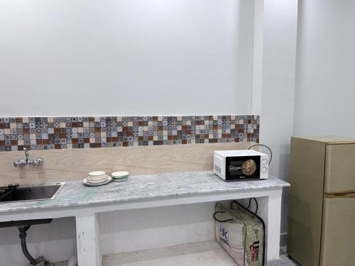 Cocina, Karianwala Apartment in Gujrat (Punjab)
