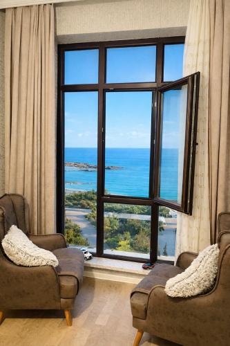 Cozy City Center Apartment with Full Sea View – khách sạn tại Novxanı