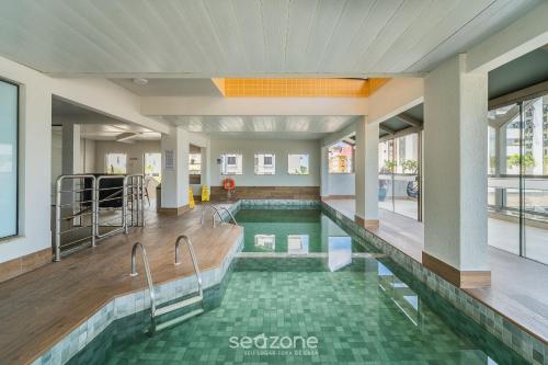 Swimming pool, Apt em Cond c/ piscina aquecida em Floripa CUR0716 in Itacorubi