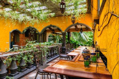 Dārzs, La Hacienda Hotel, at Xcaret in Los Dos Compadres