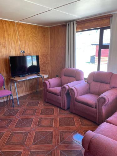 Koplietošanas atpūtas telpa ar TV, Cabañas Valles del Mañihuales (Cabanas Valles del Manihuales) in Puerto Aisena