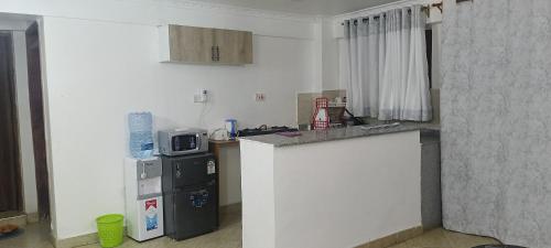 Cuina, Modern 1BR Apartment in Membley & near Ruiru Bypass, Kenyatta University & AMREF, Fast WiFi & Parkin in Ruiru