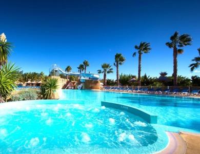 Swimming pool, Vias plage "MER & SOLEIL" Mobil home camping La Carabasse 6 a 8 personnes in Vias