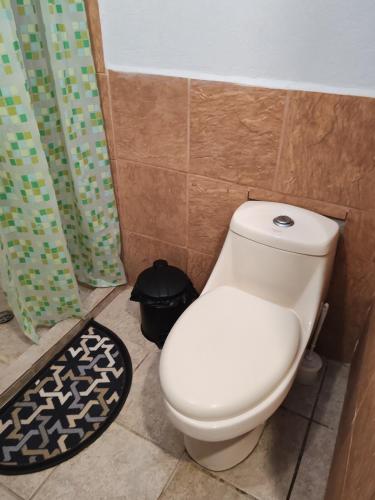 Casa de banho, Bonito apartamento 103 frente a la piscina 100mt del mar in Playa Flamingo