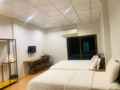 수랏타니 โรงแรมควีนส์ (Queen) 4성급 호텔 스위트룸