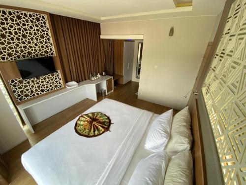 Grand Bunda Hotel Syariah Bukittinggi Powered By Archipelago in 古格班恩