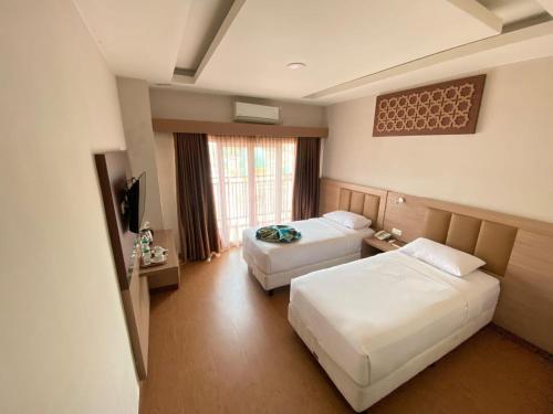 Grand Bunda Hotel Syariah Bukittinggi Powered By Archipelago in 古格班恩