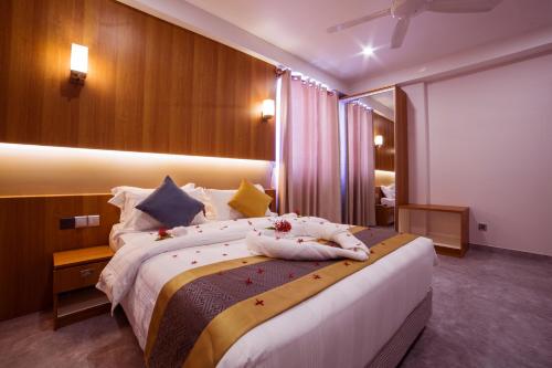 Kuredhi Beach Inn Room Type - Deluxe Double Room with Balcony Kuredhi Beach Inn Room Type - Deluxe Double Room with Balcony