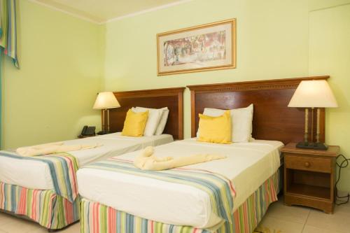 Palm Garden Hotel Barbados Palm Garden Hotel Barbados is a popular choice amongst travelers in Christ Church, whether exploring or just passing through. The property offers a high standard of service and amenities to suit the i