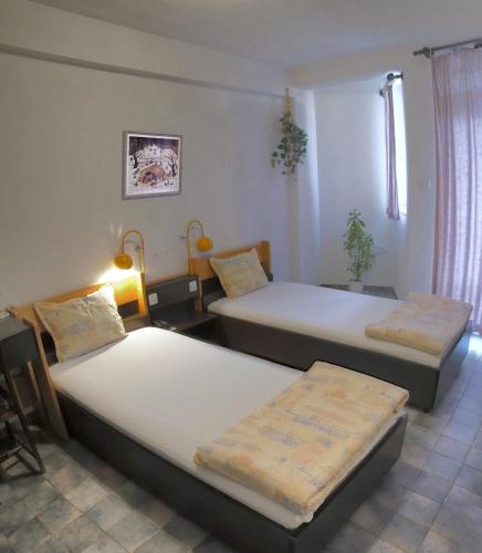 Twin Room with Private External Bathroom and Balcony