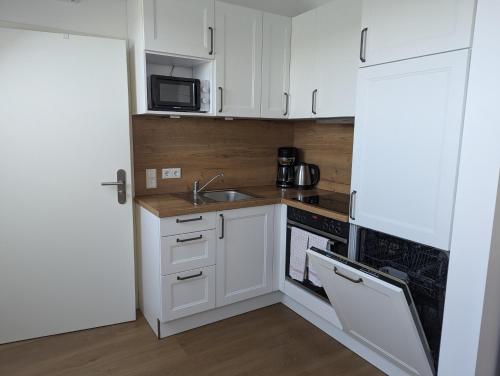 virtuve, Moderne Gästezimmer und Studios auf dem Heskeshof (Moderne Gastezimmer und Studios auf dem Heskeshof) in Kempen (North Rhine-Westphalia)