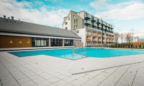 Apartamenty Waterline Kołobrzeg, Baseny i Strefa Rekreacyjna, Osiedle Feniks – khách sạn tại Podczele
