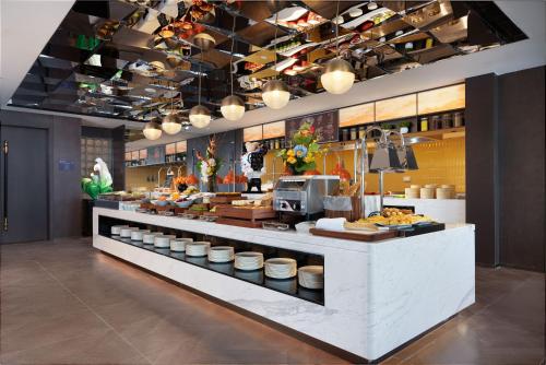 Mad og drikke, 上饶凤凰大道希尔顿欢朋酒店 in Shangrao