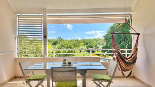 Bel appartement spacieux avec piscine et proche des plages - Le Mimosa - Location saisonnière - Sainte-Anne
