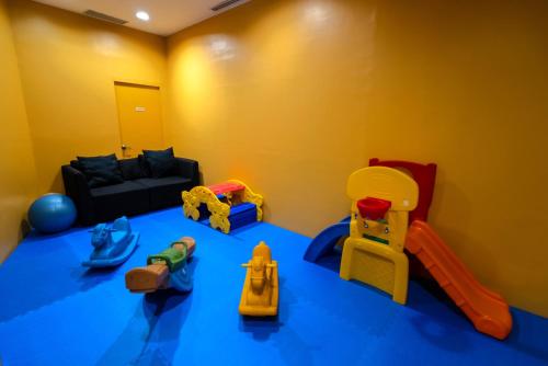Playground, The Alpha Suites near Malate Church