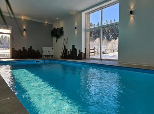 Gîte maison entière, piscine intérieure chauffée privée, proche Alsace gîte à louer Mandray