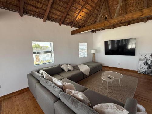 Közös társalgó / TV, Old Harbour Place in Gansbaai