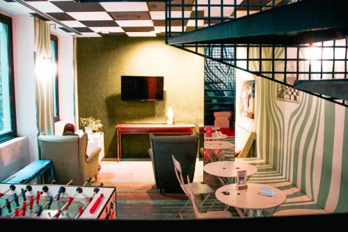 ห้องส่วนกลางสำหรับนั่งเล่น/ดูทีวี, ออสเตลโล เบลโล กรันเด (Ostello Bello Grande) in มิลาน