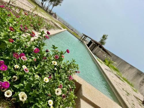 Villa avec piscine et pieds dans l'eau in Palmarin