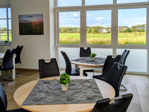 Koplietošanas atpūtas telpa ar TV, Moderne Gästezimmer und Studios auf dem Heskeshof (Moderne Gastezimmer und Studios auf dem Heskeshof) in Kempen (North Rhine-Westphalia)