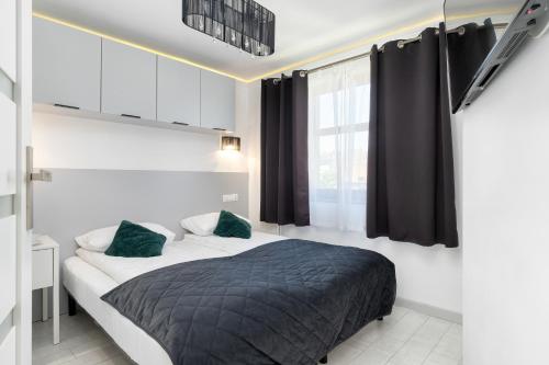 Charming Apartments in Sopot with Parking by Noclegi Renters - image 5