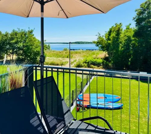 8 Personen Ferienhaus ,,Seegelblick" am Goitzschesee, erste Reihe am Strand mit Sauna, Whirlpool, Kamin, Wallbox & SUP in Pouch, Deutschland