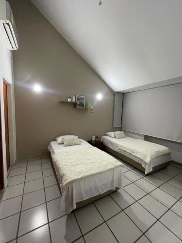 Habitaciones premium con acceso a coworking y piscina