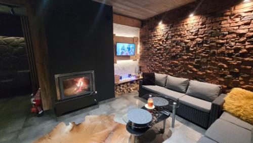 Koplietošanas atpūtas telpa ar TV, Cudodomek SPA Loft koło Ełku (Cudodomek SPA Loft kolo Elku) in Mrozy Wielkie